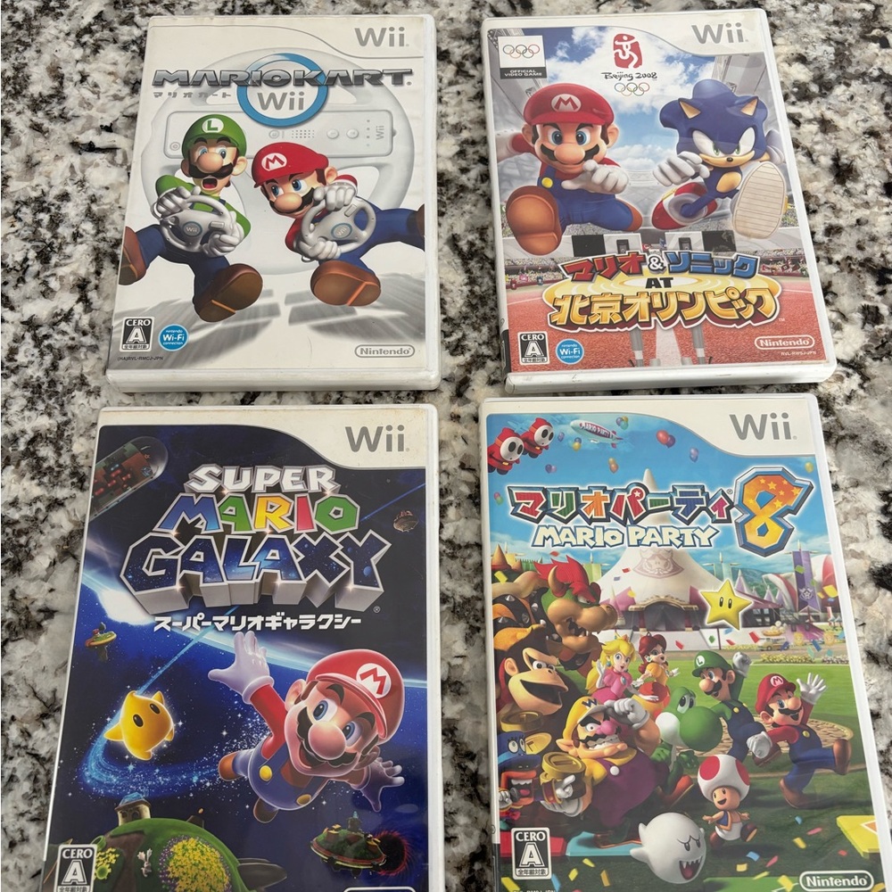 Wii Mario game lot Japanese Mario kart Mario party galaxy and Olympics